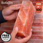 Himalayan salt block held by a hand with product details on an orange background